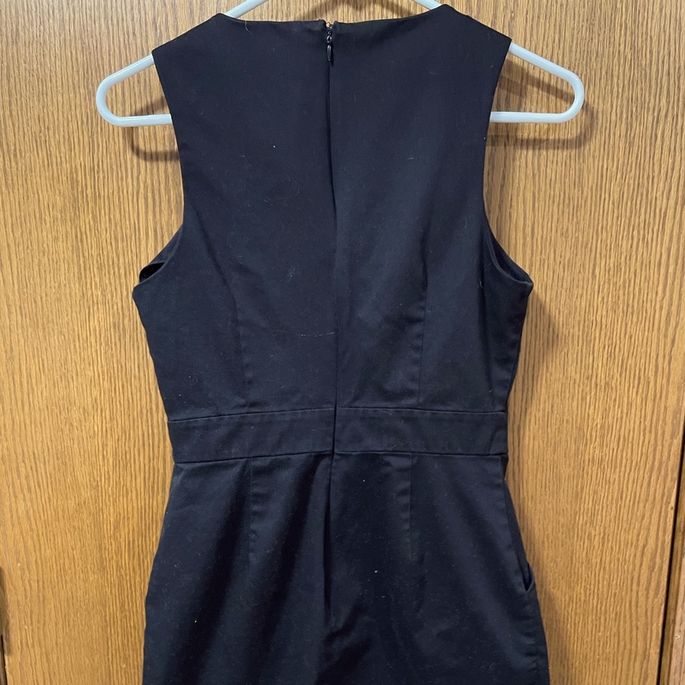 Black fitted dress with pockets